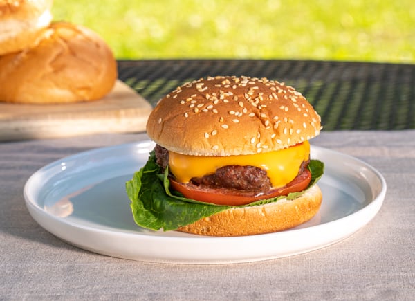 Pay for a burger in pieces.